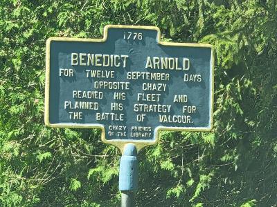 A Chazy, NY, historic marker that indicates Benedict Arnold and his fleet stayed opposite Chazy for 14 days in September 1776 to prepare for and plan strategy for the Battle of Valcour. 